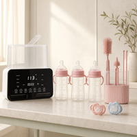 Pack Biberons à la Maison Bibimood avec stérilisateur, trois biberons, brosses et deux sucettes