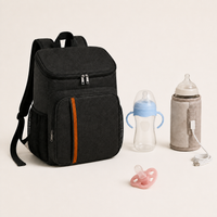 Pack Voyage Bibimood noir avec biberon bleu et sucette rose